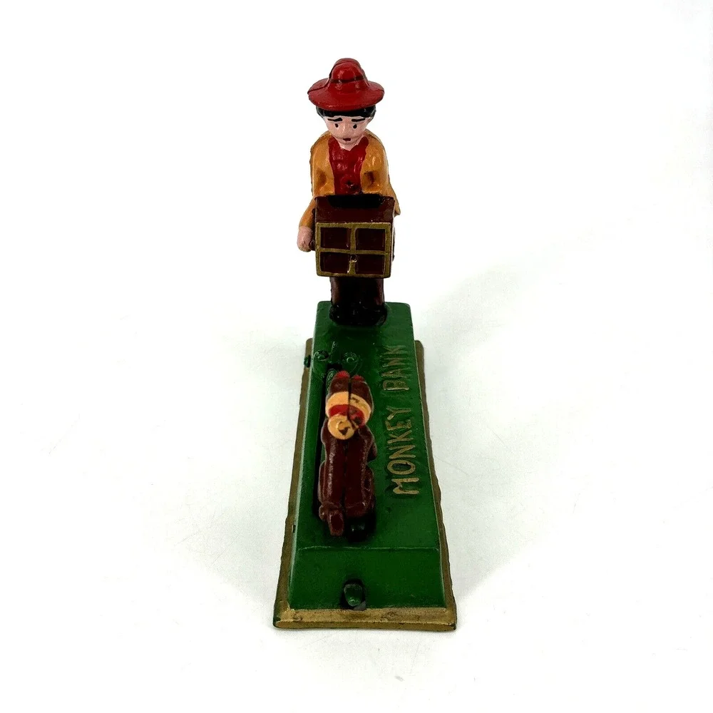ORGAN GRINDER MONKEY BANK Cast Iron Works Great‎